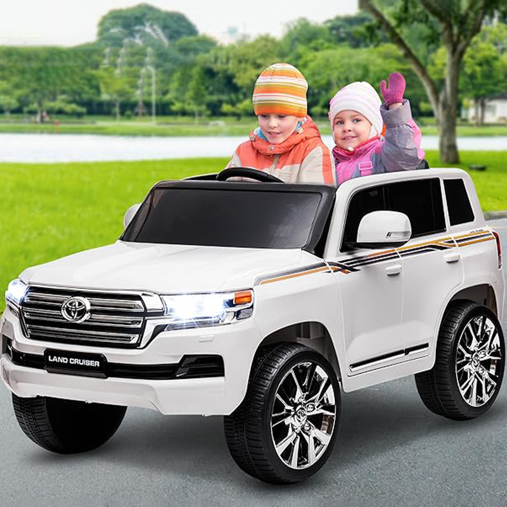 Children enjoying outdoor drive in Land Cruiser